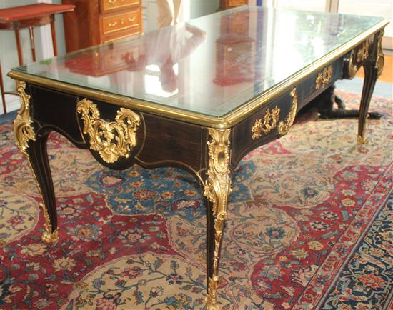 An early Louis XV brass inlaid ebony veneered bureau plat, W.6ft 6in. H.2ft 7.5in.